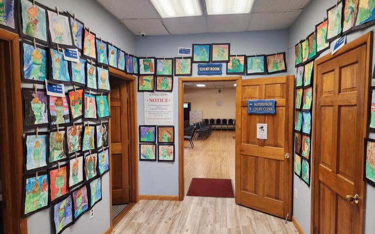 Town Hall walls covered with artwork by Myer Elementary School students